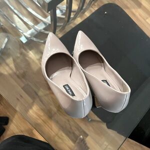 Blush Nine West heels. Some minor wear.